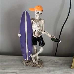 Skeleton Surfer Figurine with Purple Surfboard